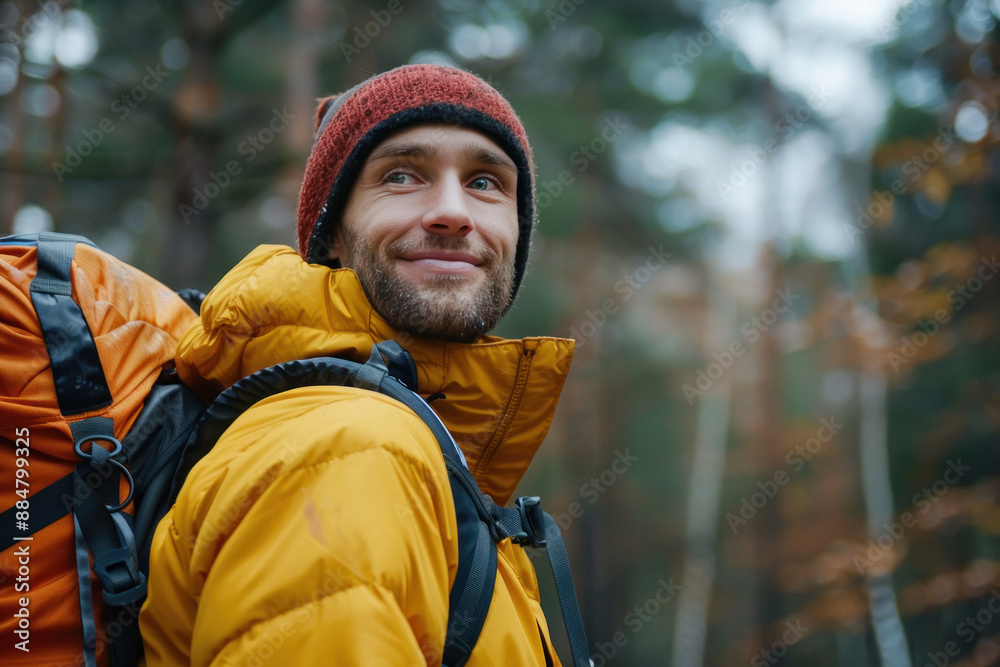 Man hiking with backpack, expressing happiness Man hiking with backpack, expressing happiness