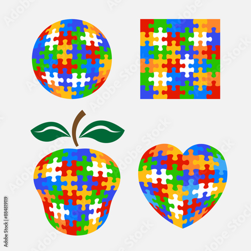 Autism Awareness Day symbols set. Design elements in colorful puzzle pieces.