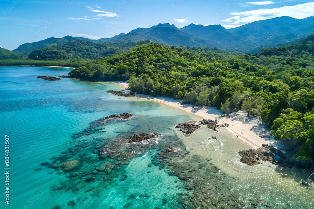 Aerial view of Nanteto beach on Greatala Flat Rock Island, with beautiful clear turquoise water and white sandy beaches, and lush green rainforest mountains in the background, perfect for a summer hol Aerial view of Nanteto beach on Greatala Flat Rock Island, with beautiful clear turquoise water and white sandy beaches, and lush green rainforest mountains in the background, perfect for a summer hol