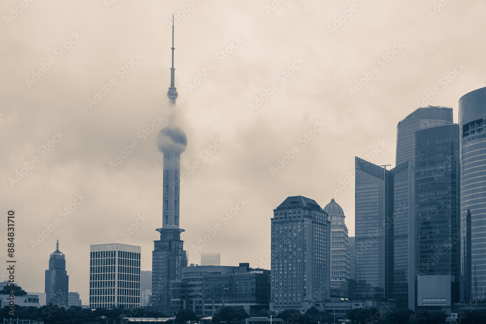 Tower over the fog; blue colortone Tower over the fog; blue colortone