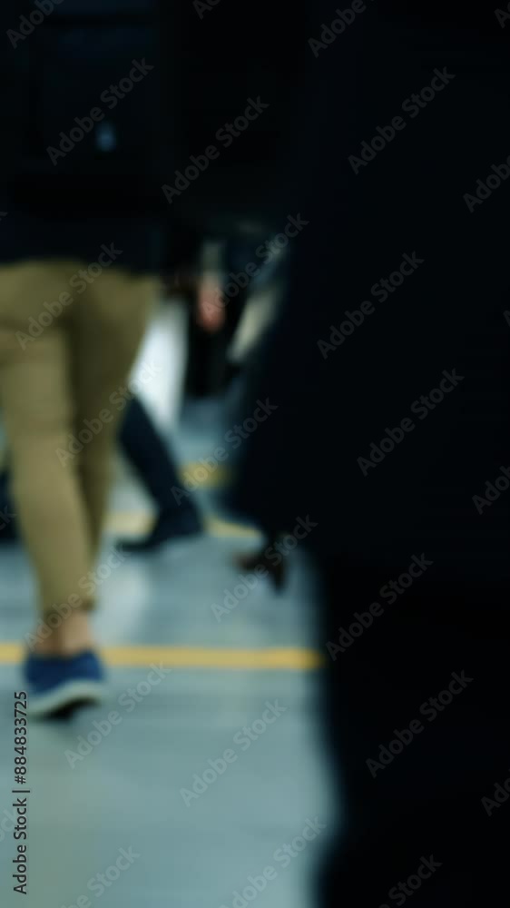Many commuters going to work in the busy morning rush hour. Slow motion. Low angle.
Many commuters going to work in the busy morning rush hour. Slow motion. Low angle.
