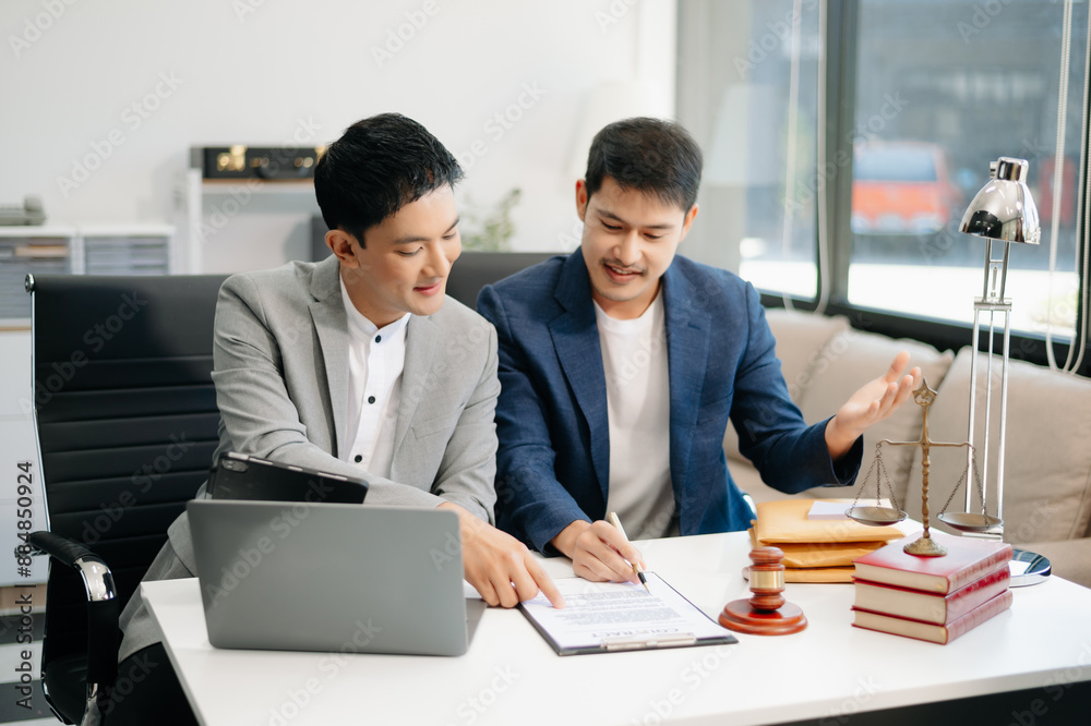 business people and lawyers discussing contract papers sitting at the table. Concepts of law, advice, legal services. business people and lawyers discussing contract papers sitting at the table. Concepts of law, advice, legal services.