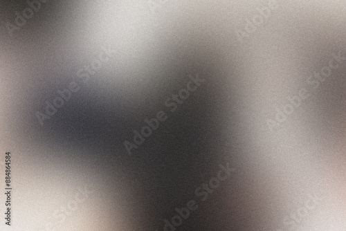 Abstract gray and white gradient background with a subtle grainy texture