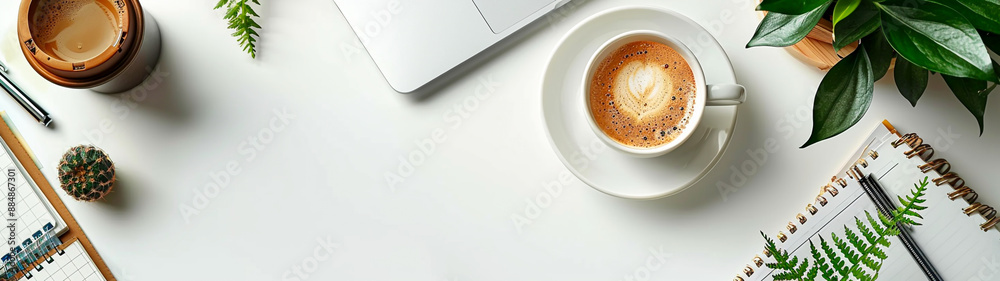 Modern Minimalist Workspace with Laptop, Coffee Cup, and Stationery on White Background