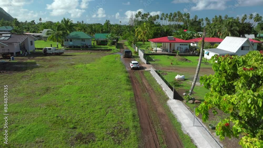 Teahupoo Tahiti French Polynesia aerial drone view end of the road neighborhood homes van car drive island coast to Papeete morning sunny bay channel coral reef valley river forward motion Teahupoo Tahiti French Polynesia aerial drone view end of the road neighborhood homes van car drive island coast to Papeete morning sunny bay channel coral reef valley river forward motion