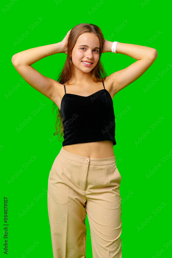 Smiling Young Woman in Black Top and Tan Pants Portrait Smiling Young Woman in Black Top and Tan Pants Portrait