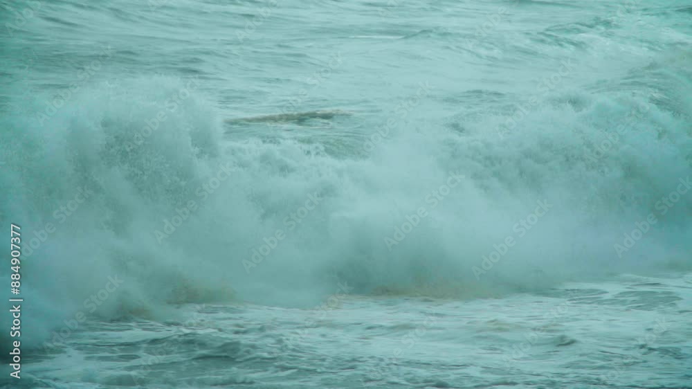 Storm swell waves crashing into the shore Storm swell waves crashing into the shore