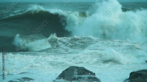 Storm swell waves crashing into the shore