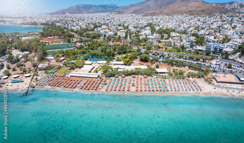 Fototapeta Naklejka Na Ścianę i Meble -  Aerial view of the beautiful Voula beach with the skyline of Athens in the background, Greece