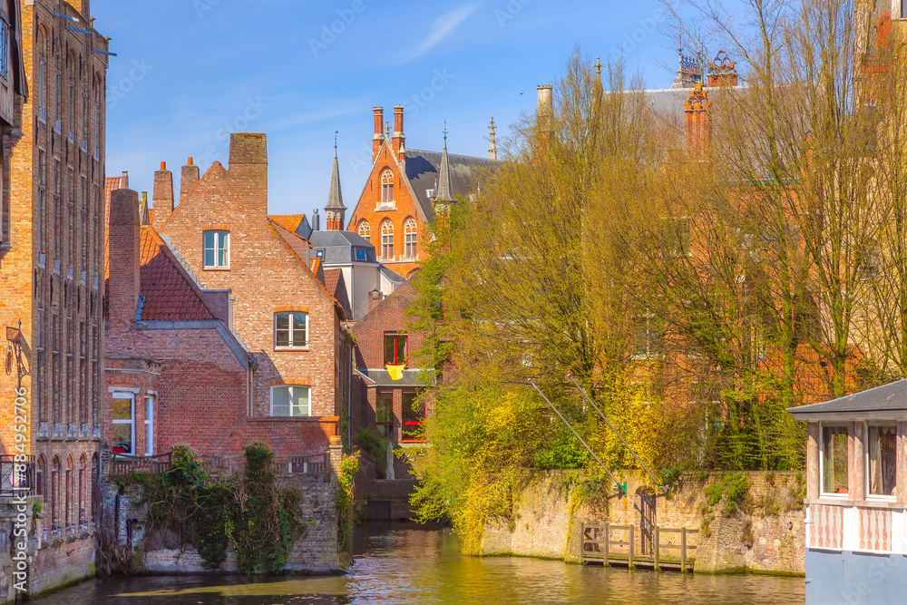 Naklejka premium Scenic cityscape with canal in Bruges, Belgium
