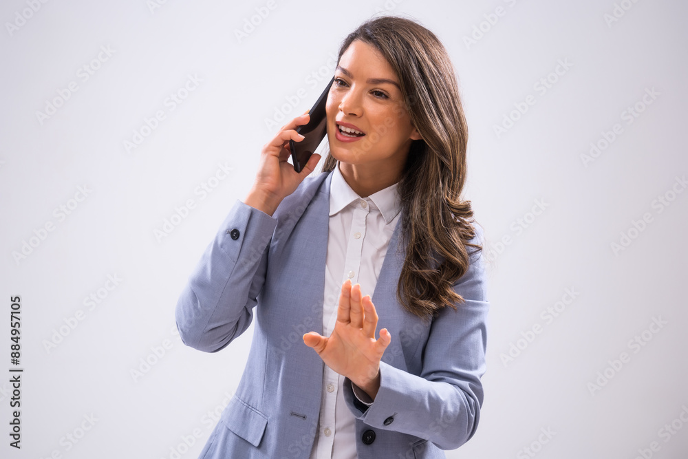 Portrait of happy businesswoman who is talking on smartphone. Portrait of happy businesswoman who is talking on smartphone.