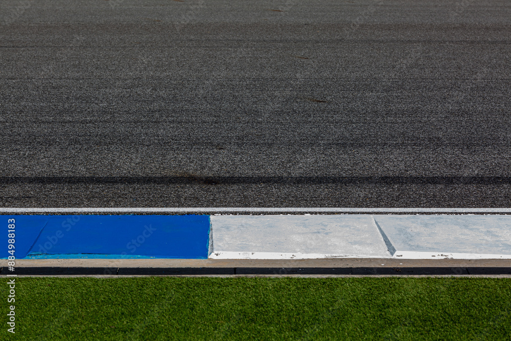 Fototapeta premium Asphalt race track with black tire mark texture and background, Abstract asphalt road race track background , Tire mark on race track texture and background.