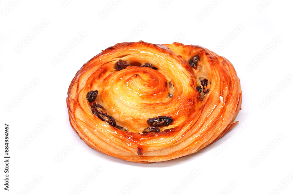 Pain aux raisins isolate on white, also called escargot or pain russe, is a spiral pastry often eaten for breakfast in France. Its names translate as Pain aux raisins isolate on white, also called escargot or pain russe, is a spiral pastry often eaten for breakfast in France. Its names translate as