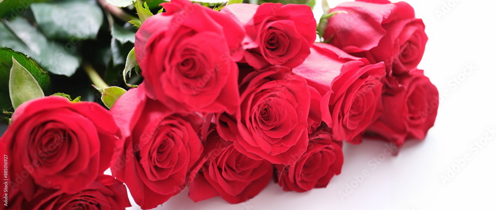 Obraz premium Close-up of luxury bouquet made of red roses, flower shop. Birthday, Valentines or mother's day celebration. Festive events concept