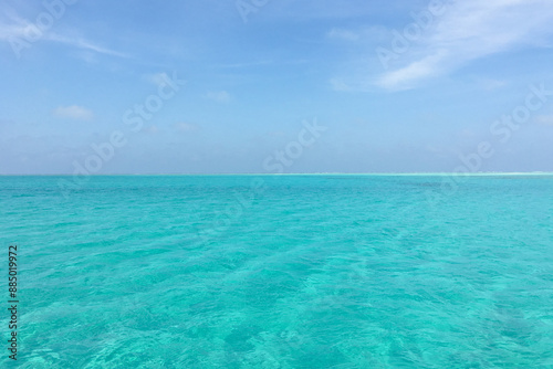 beach with blue sky and clouds