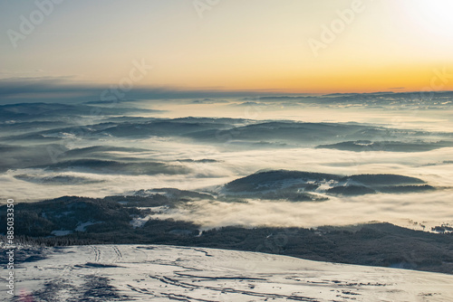 sunrise over the Tatra Mountains and snowy mountain peaks photo