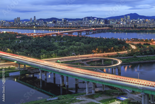 Seongdong-gu, Seoul, South Korea - August 26, 2015: High angle and night view of Yongbigyo Bridge and Dongbu Expressway on Jungnang Stream against Seongsu Bridge on Han River
 photo