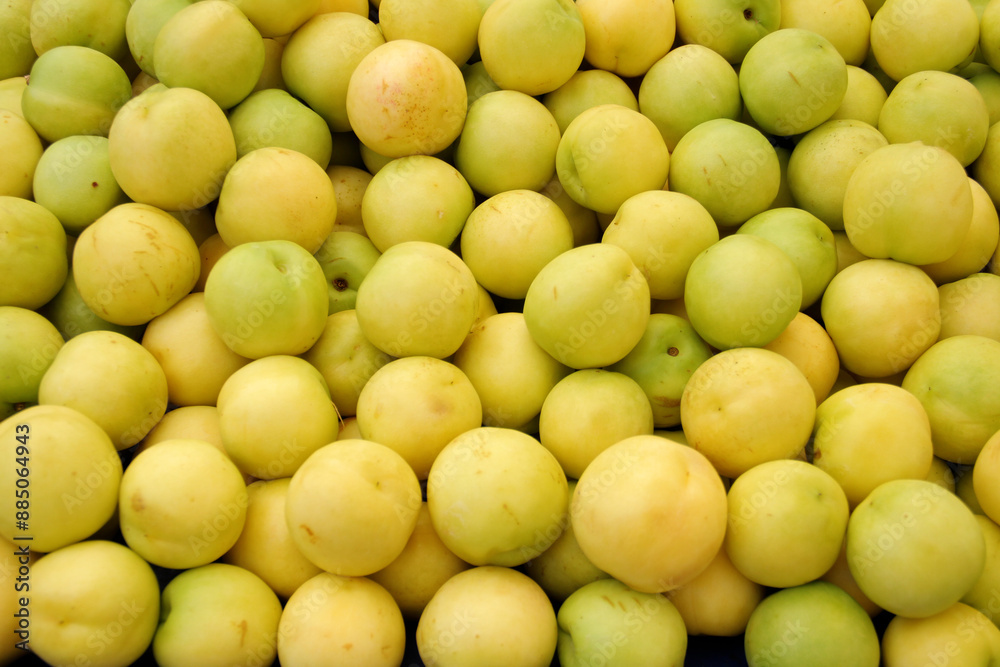 Yellow peach fruit on the market stall. Yellow nectarine fruit. Yellow peach fruit on the market stall. Yellow nectarine fruit.