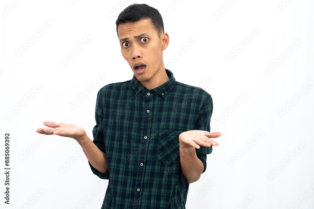 Adult Asian man showing shocked face expression isolated white backgroud Adult Asian man showing shocked face expression isolated white backgroud
