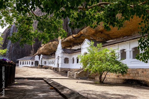 Entry into Dambulla Royal Cave Temple, Sri Lanka photo