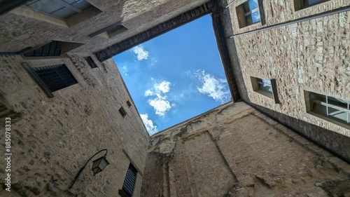 Scorcio del cielo da antico cortile storico medievale a Cagli photo