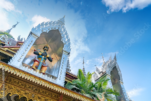 figure of Buddha and Buddhist palace in Xishuangbanna,China photo