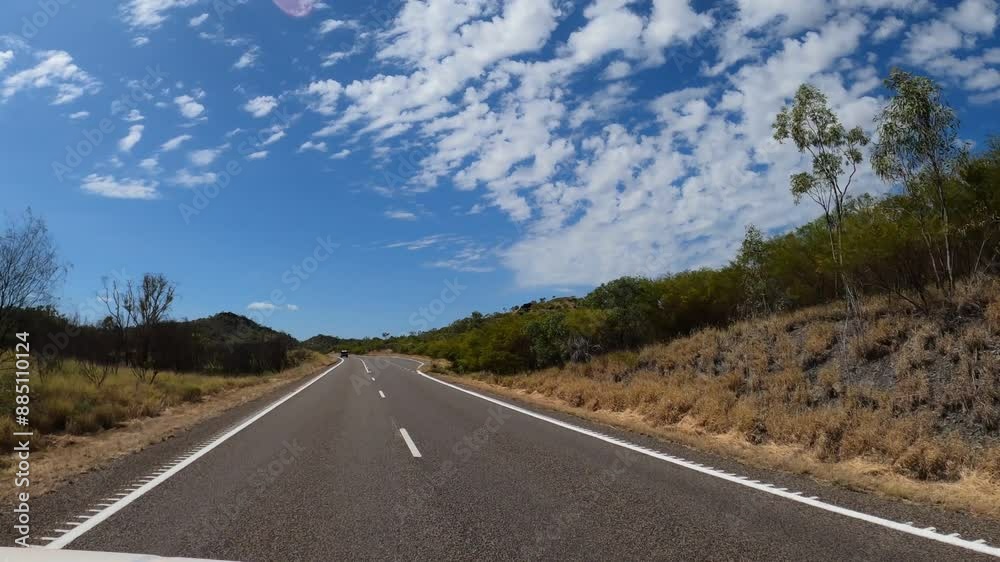POV of driving trip from Northern Territory through Queensland toward northeastern coast of Australia POV of driving trip from Northern Territory through Queensland toward northeastern coast of Australia
