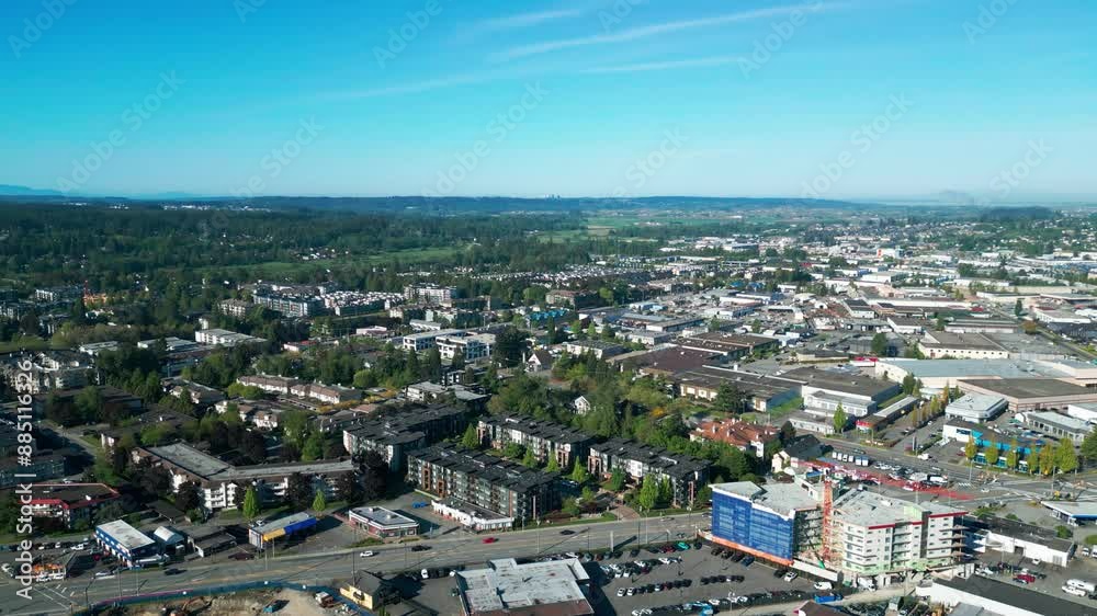 A shot over looking Langley City, with the trees and beautiful in the background. A shot over looking Langley City, with the trees and beautiful in the background.