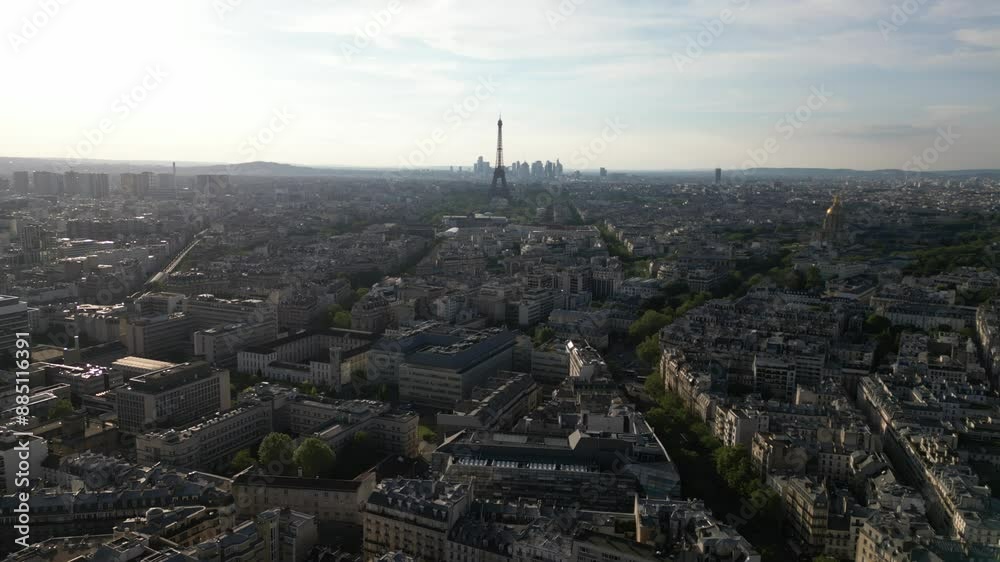 Paris cityscape with Tour Eiffel and La Defense skyscrapers in background, France. Aerial drone view Paris cityscape with Tour Eiffel and La Defense skyscrapers in background, France. Aerial drone view