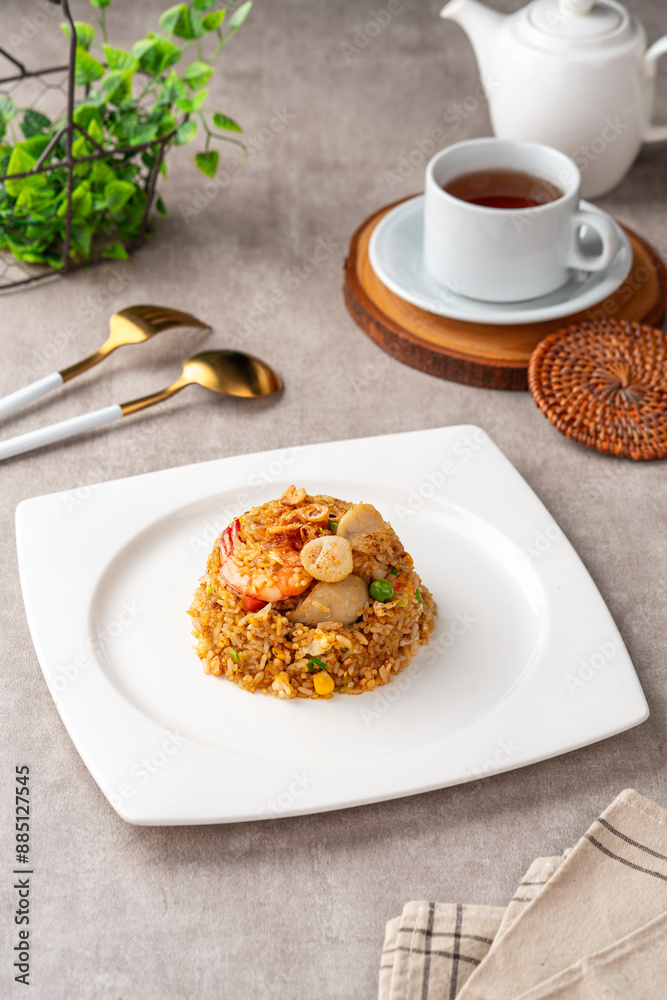 Asian fried rice (Indonesian: nasi goreng) with squid, prawns, and fish baso Asian fried rice (Indonesian: nasi goreng) with squid, prawns, and fish baso