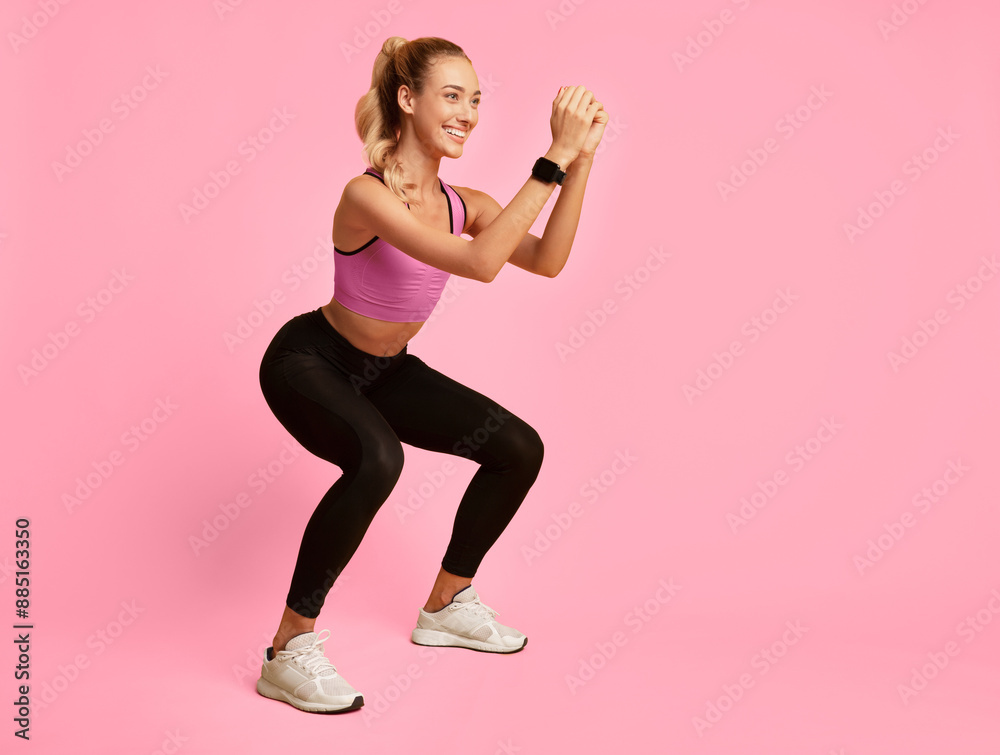 Workout Concept. Girl Doing Deep Squat Exercise On Yellow Background In Studio. Free Space