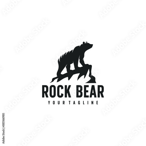 the bear logo stands on a rock cliff