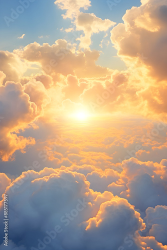 Voluminous Clouds Illuminated by a Warm Glow Set Against a Distant Landscape in a Majestic Sky © Catherine