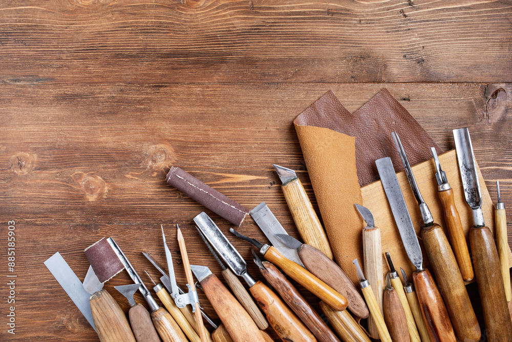 Fototapeta premium Wood carving tools. Carpentry workshop desk for joinery and woodworking top view.