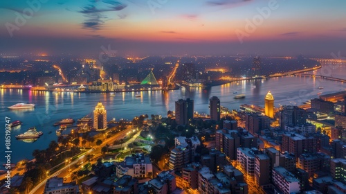 Capture the evening charm of Cairo from above, with illuminated landmarks, bustling streets, and the city's dynamic nightlife visible photo