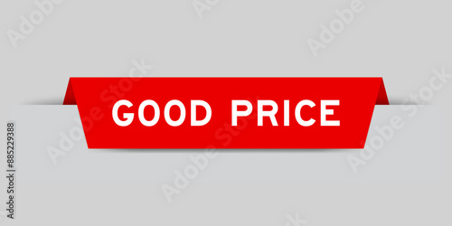 Red color inserted label with word good price on gray background