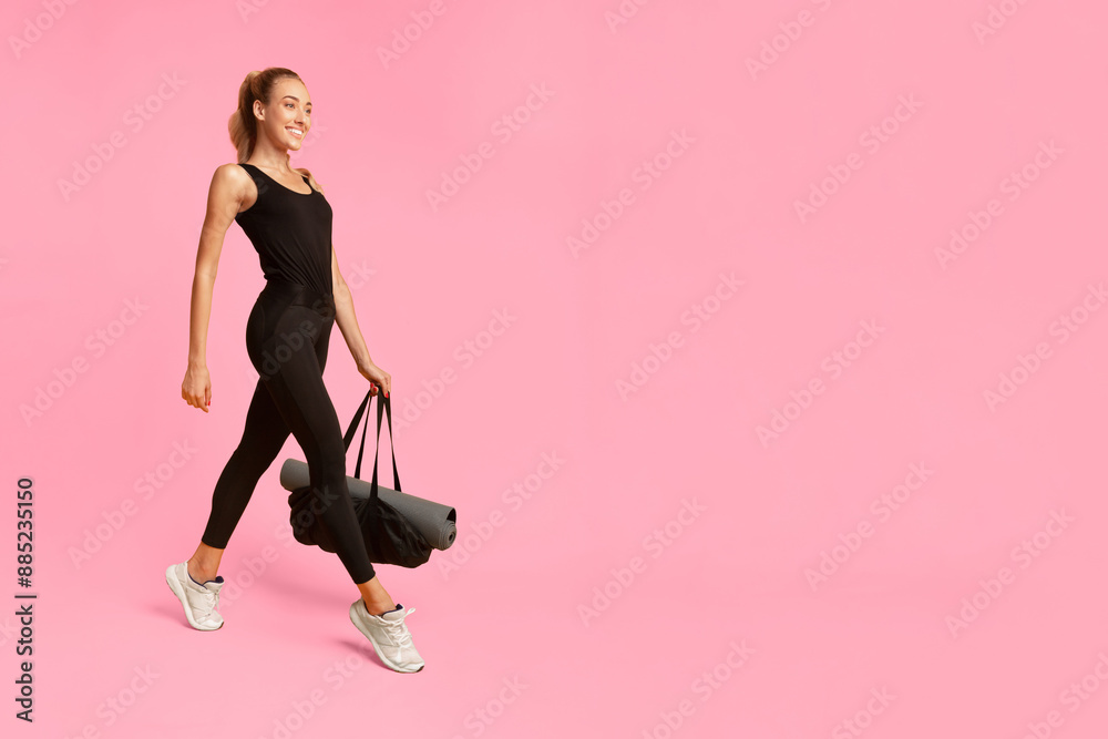 Smiling Fitness Lady Going To Gym Carrying Bag With Rolling Mat On Yellow Studio Background. Full Length Smiling Fitness Lady Going To Gym Carrying Bag With Rolling Mat On Yellow Studio Background. Full Length