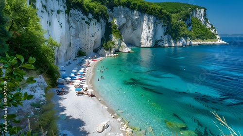 A beach with white cliffs and clear blue img © Yelena