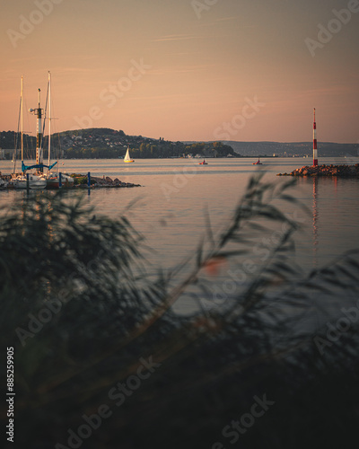 Sailboat on lake Balaton in summer in the sunset