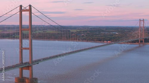 Enter a world of wonder in this aerial drone video, where the Humber Bridge basks in the glow of a setting sun, with cars meandering like fireflies along its span.