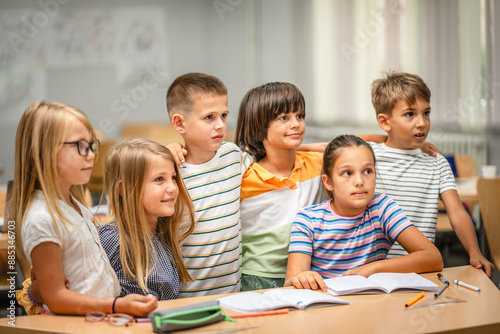 Portrait of group of young students classmates in the classroom