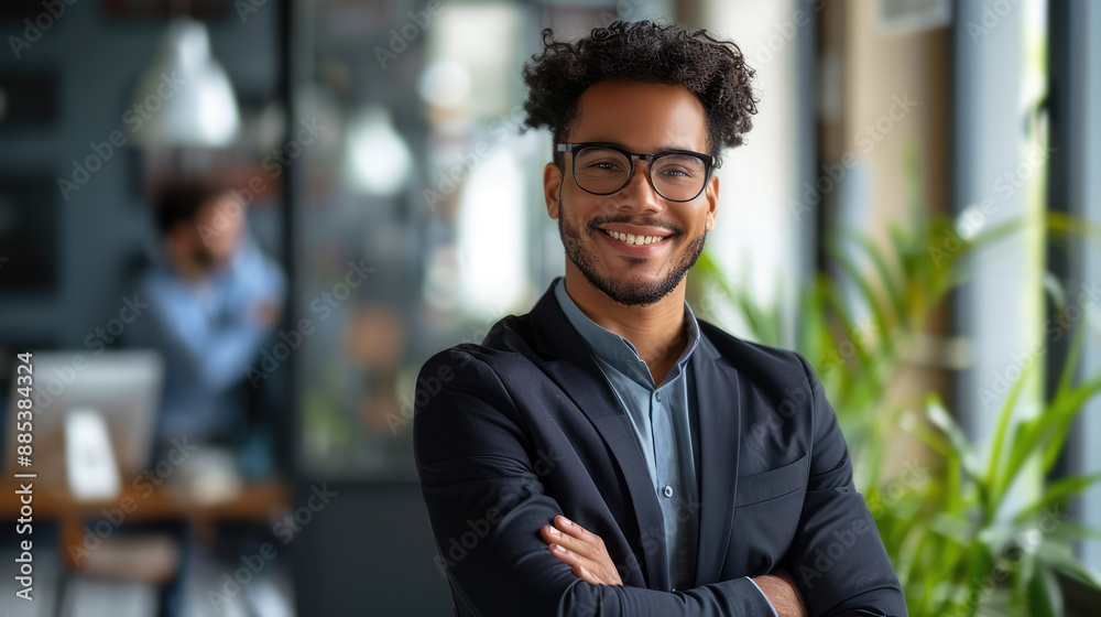 portrait of a handsome young black man in a suit
