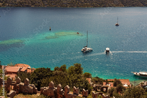 views of simena castle or kalekoy ancient lycian village in kekova region antalya, turkey photo