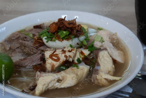 close up of a chicken and beef soto. Indonesian food photo