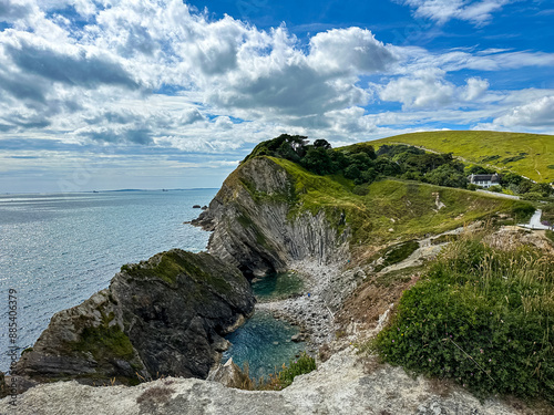 Jurassic coast view in Dorset, England, UK. Stair Hole near Lulworth Cove. Lulworth Cove cliffs view on a way to Durdle Door. The Jurassic Coast is a World Heritage Site on the English Channel coast 