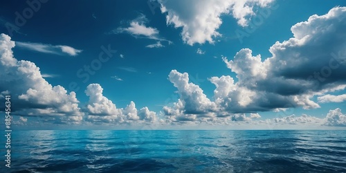 Beautiful blue ocean with blue sky and clouds background.