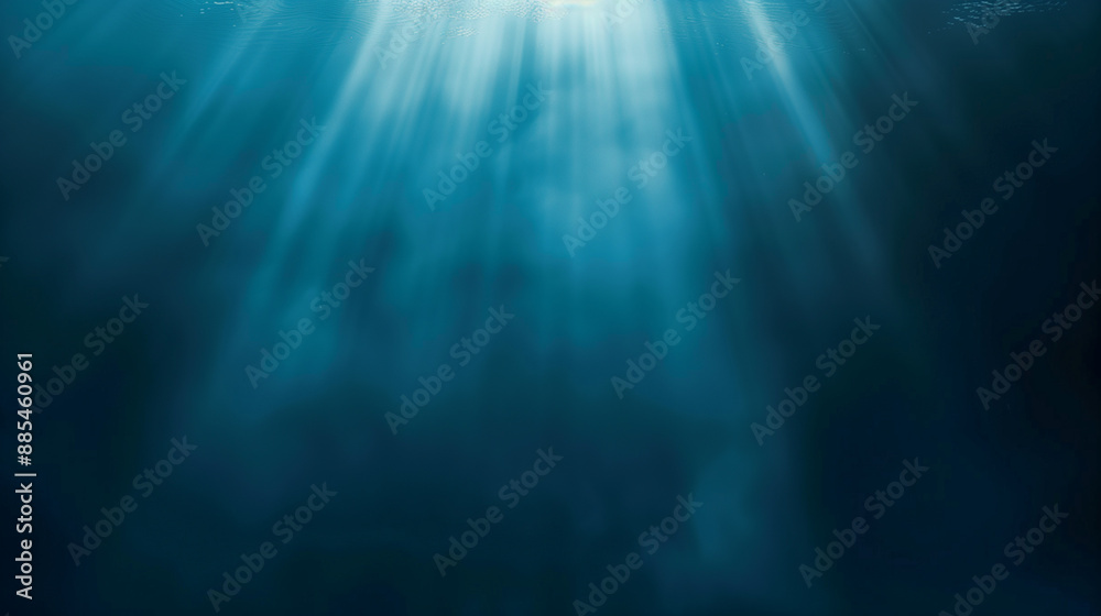 The image is of a blue ocean with sunlight shining through the water. The light creates a beautiful and serene atmosphere The image is of a blue ocean with sunlight shining through the water. The light creates a beautiful and serene atmosphere