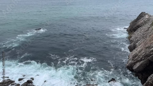 waves crashing on rocks