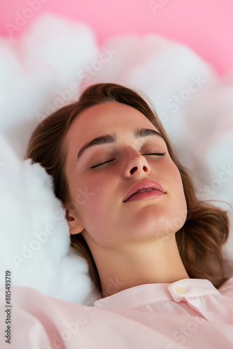 Teens snoozing on clouds amidst dream inspired fanciful landscapes 