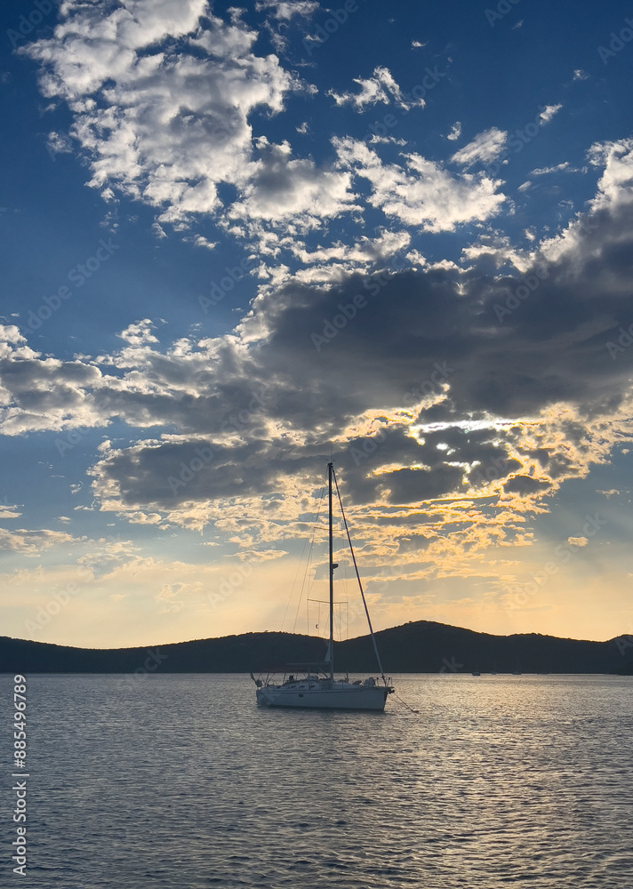 Fototapeta premium sailing ship at sunset